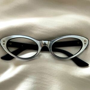 Vintage cat eye frames in luminous silver. "Capistrano" by American Optics.